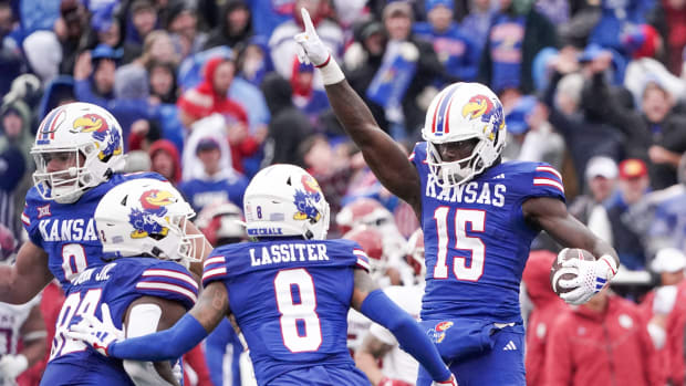 Oct 28, 2023; Lawrence, Kansas, USA; Kansas Jayhawks linebacker Craig Young (15) celebrates after recovering a fumble against the Oklahoma Sooners during the second half at David Booth Kansas Memorial Stadium.